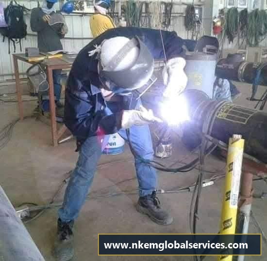 6G Pipe Welder executing spool weld in fabrication shop
