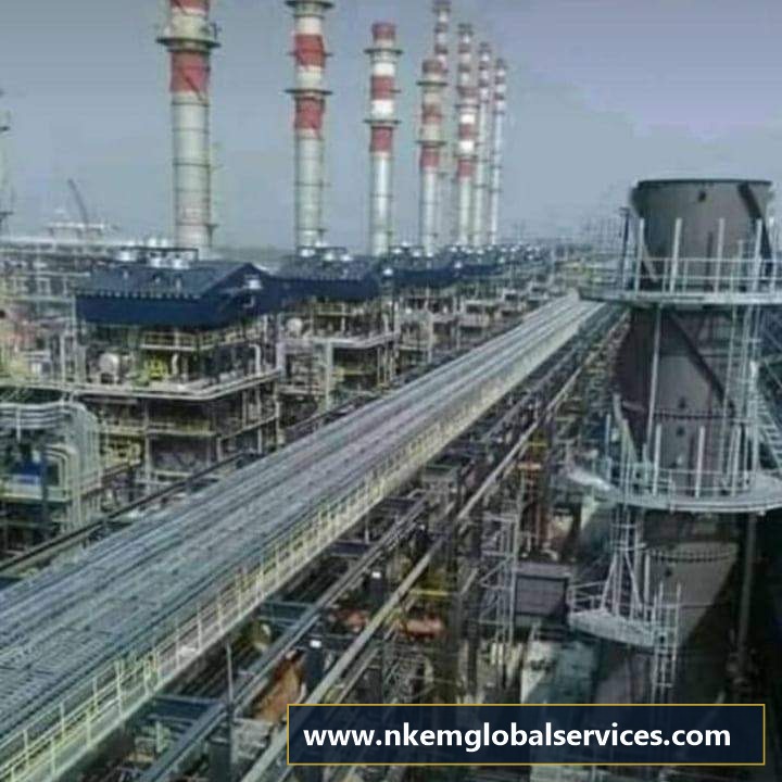 Oil Refinery and Industrial Process Plant with elevated pipe racks and stacks