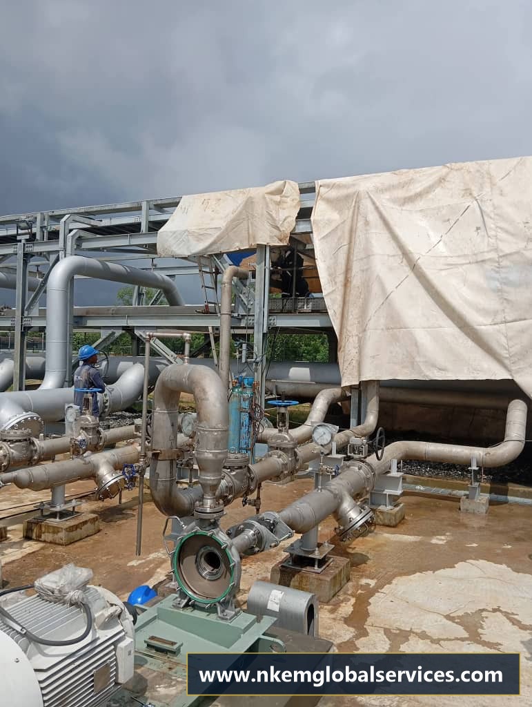 Centrifugal process pump skid, drive motor, and manifold piping